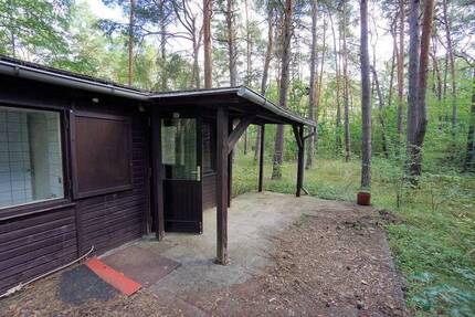 Ein großes Freizeitgrundstück mit Ferienhaus und Nebengebäude zimmer