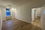 Erstbezug nach Kernsanierung Moderne 2-Zimmer-Wohnung mit sonnigem Südwestbalkon in ruhiger Lage