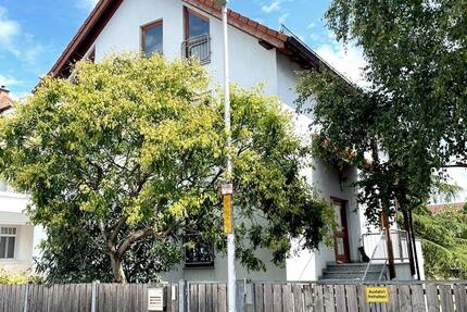 Freistehendes Einfamilienhaus mit großem Garten in Altrheinlage