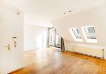 Lichtdurchflutete Dachgeschoßwohnung in Spandauer Kiezlage