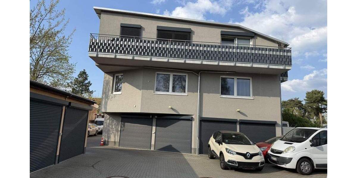 Energieeffizientes Wohn- und Geschäftshaus zimmer