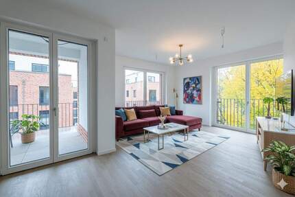 Kurzfristig bezugsfertig: Traumhafte 5-Zimmer-Neubau-Wohnung mit großer Loggia - direkt am Wasser 5 zimmer