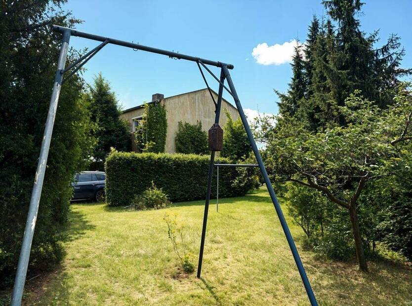 Familienidyll in Berlin-Lichtenrade: Reihenendhaus mit großem Garten & Sanierungspotenzial